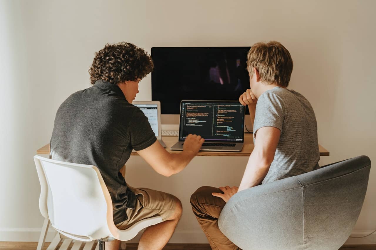 two male software developers working