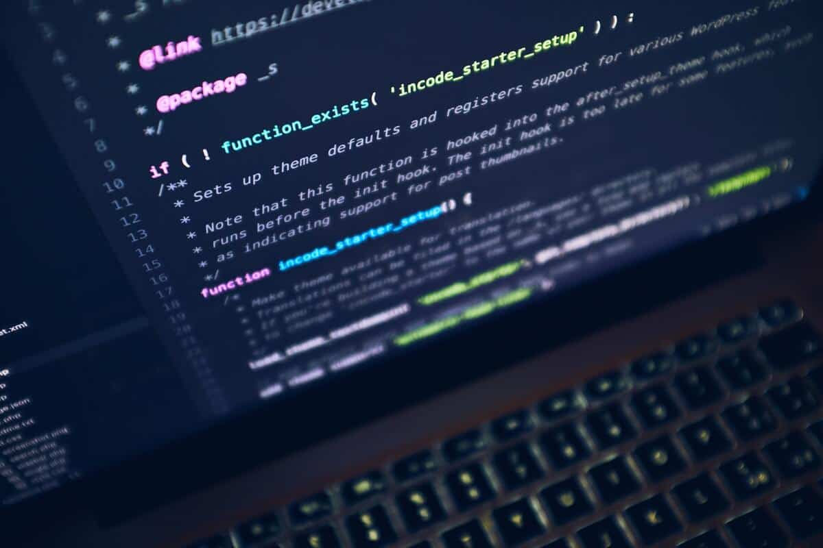 A black flat screen computer screen with code displayed on it
