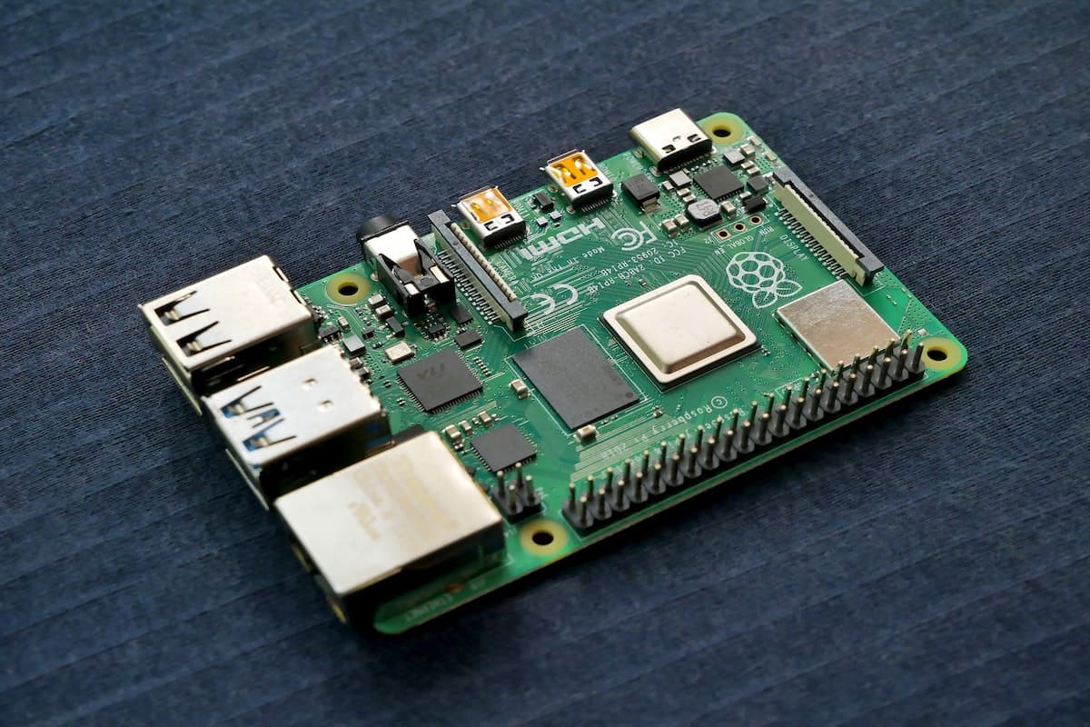 A Raspberry Pi computer’s circuit board sits on a cloth.