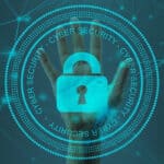 A picture of a circle with a lock and cyber security written on it with a background of a hand cybersecurity vs computer science